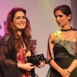 Pria with award